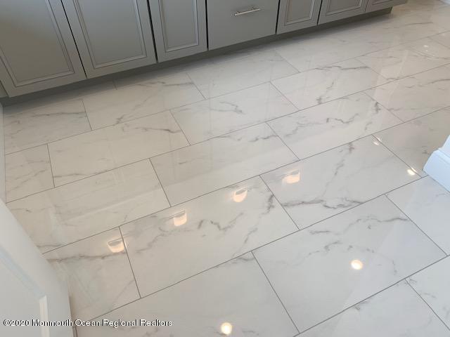 125 Shore Drive Brick, NJ 08723 - Photo 65 of 83 a view of a utility room with projector and cabinets