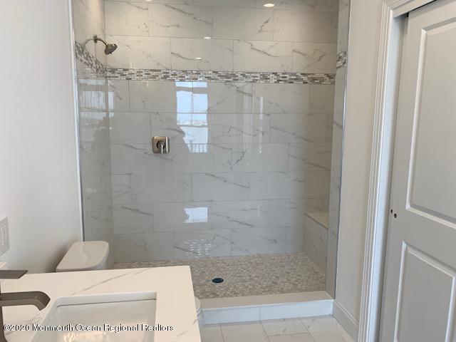 125 Shore Drive Brick, NJ 08723 - Photo 66 of 83 a bathroom with a shower