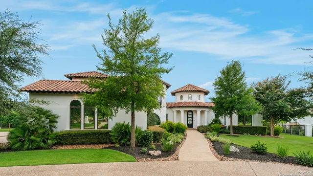 a view of a garden with a fountain
