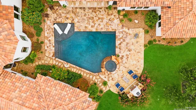 a backyard of a house with lots of green space and garden view