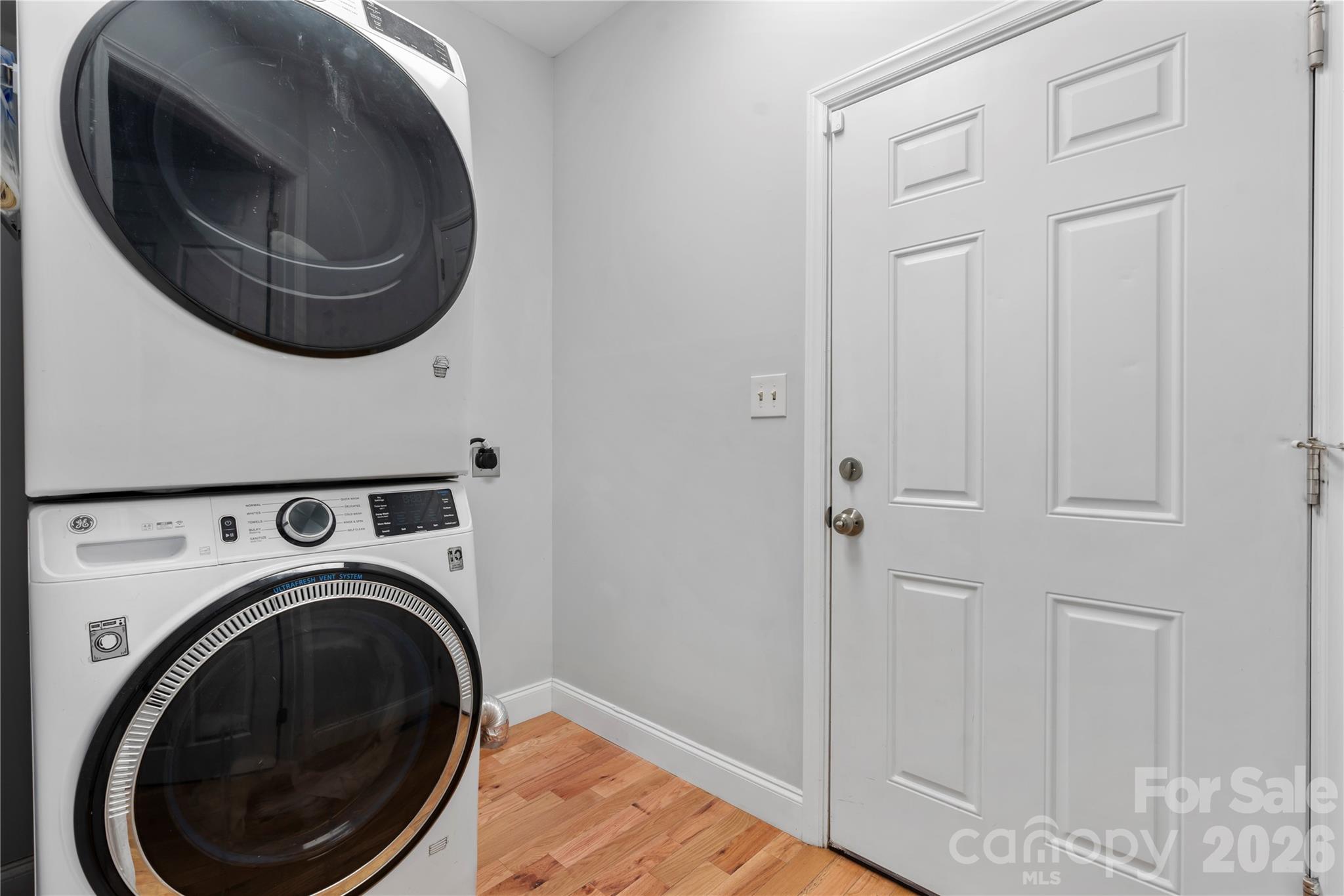 111 Pinewood Road Granite Falls, NC 28630 - Photo 22 of 33 a view of a hallway with washer and dryer