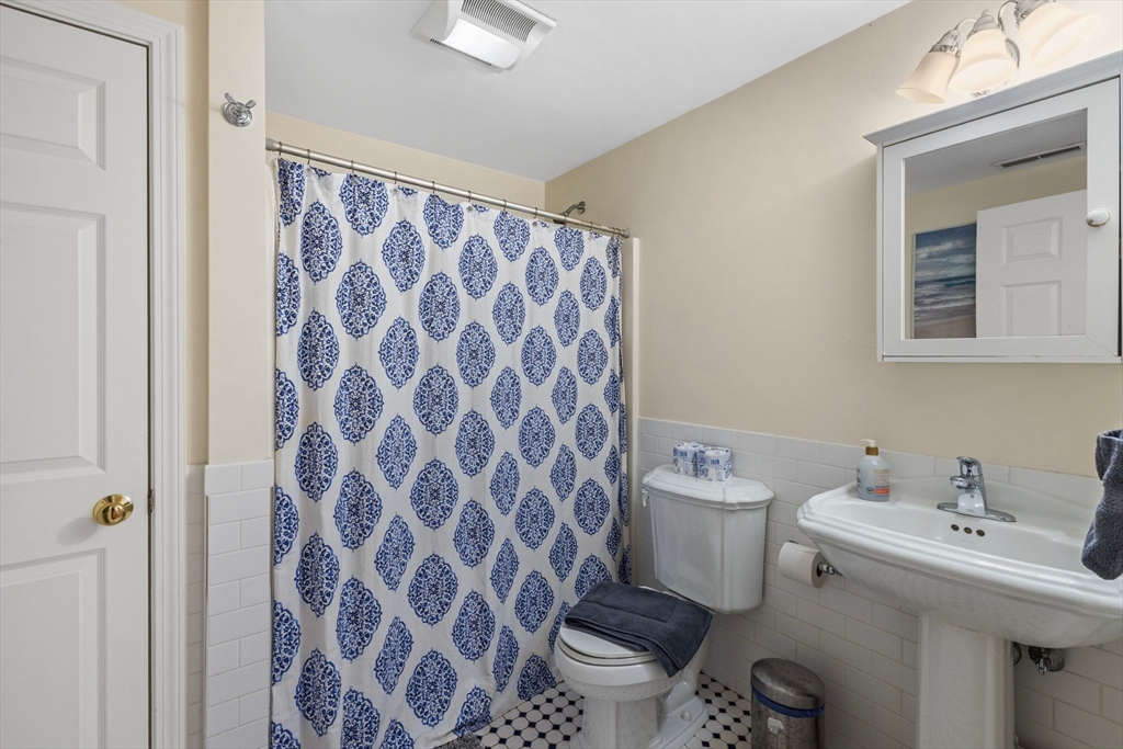 26 Central Street Manchester, MA 01944 - Photo 14 of 15 a bathroom with a sink toilet and shower