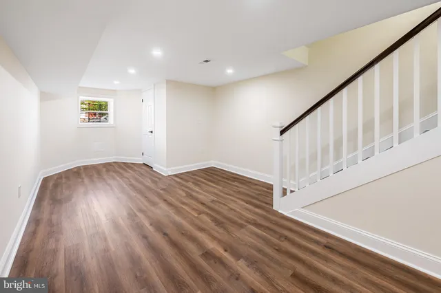 a view of entryway with wooden floor