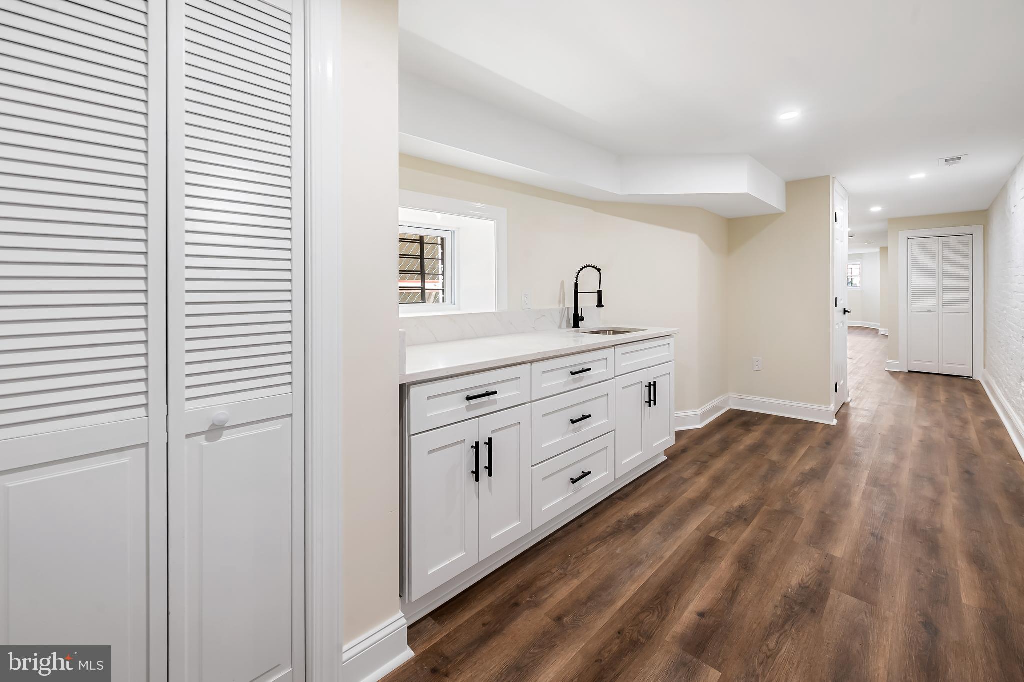 1722 McCulloh Street Baltimore, MD 21217 - Photo 32 of 36 a room with a bed and a dresser