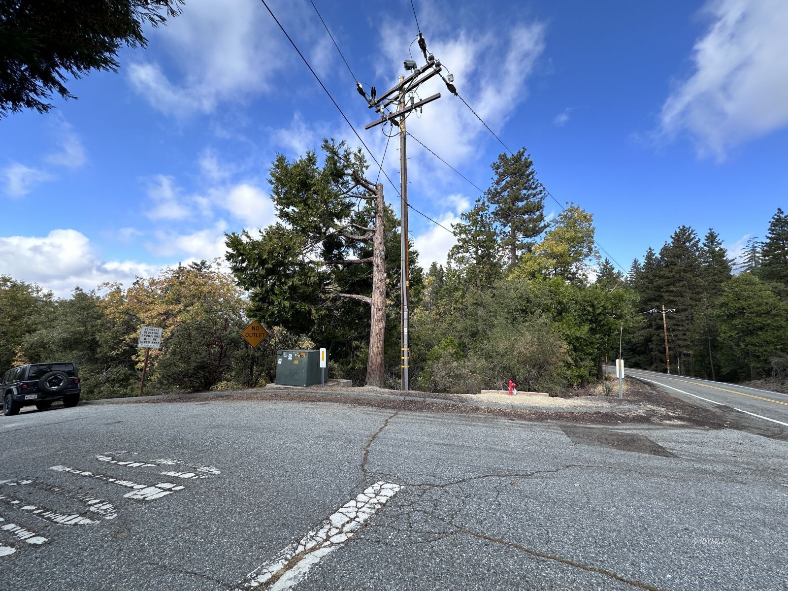 Round Robin Idyllwild, CA 92549 - Photo 11 of 12 a view of a road with a building in the background