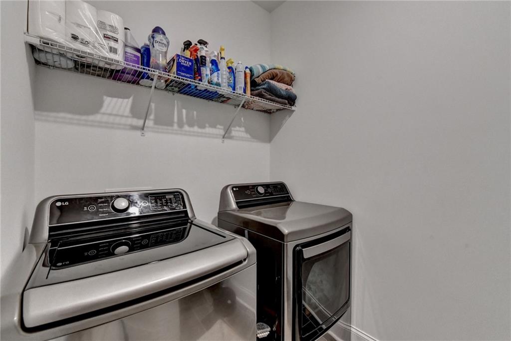 2129 Charmond Drive Monroe, GA 30656 - Photo 21 of 37 a utility room with dryer and washer