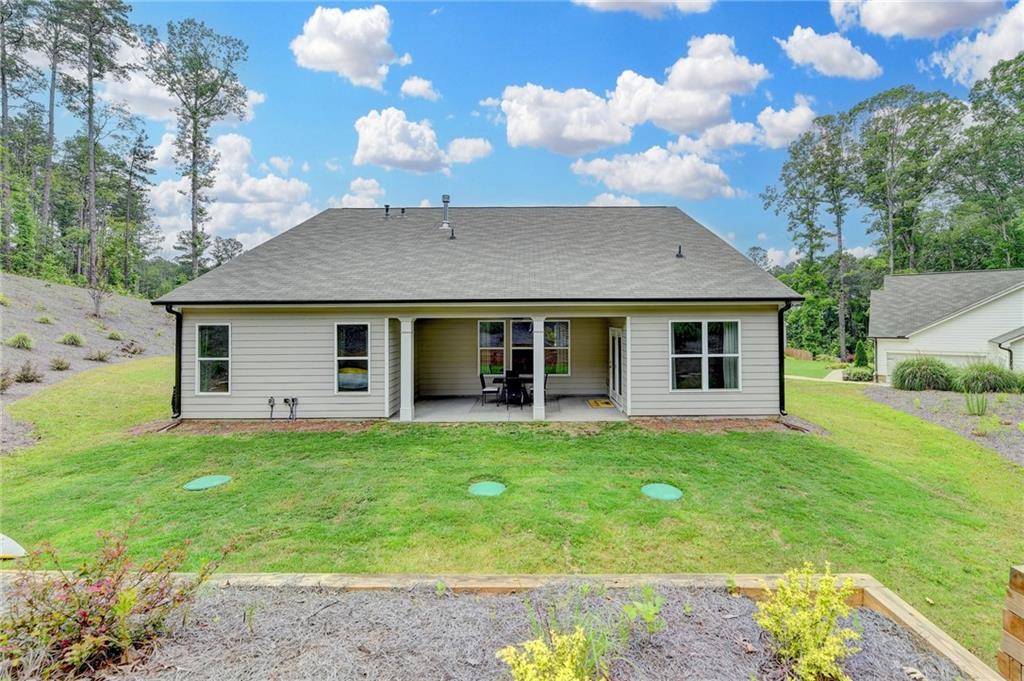 2129 Charmond Drive Monroe, GA 30656 - Photo 29 of 37 a view of a house with a backyard