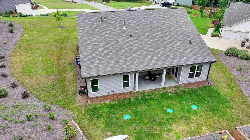 2129 Charmond Drive Monroe, GA 30656 - Photo 31 of 37 a aerial view of a house with a yard and potted plants