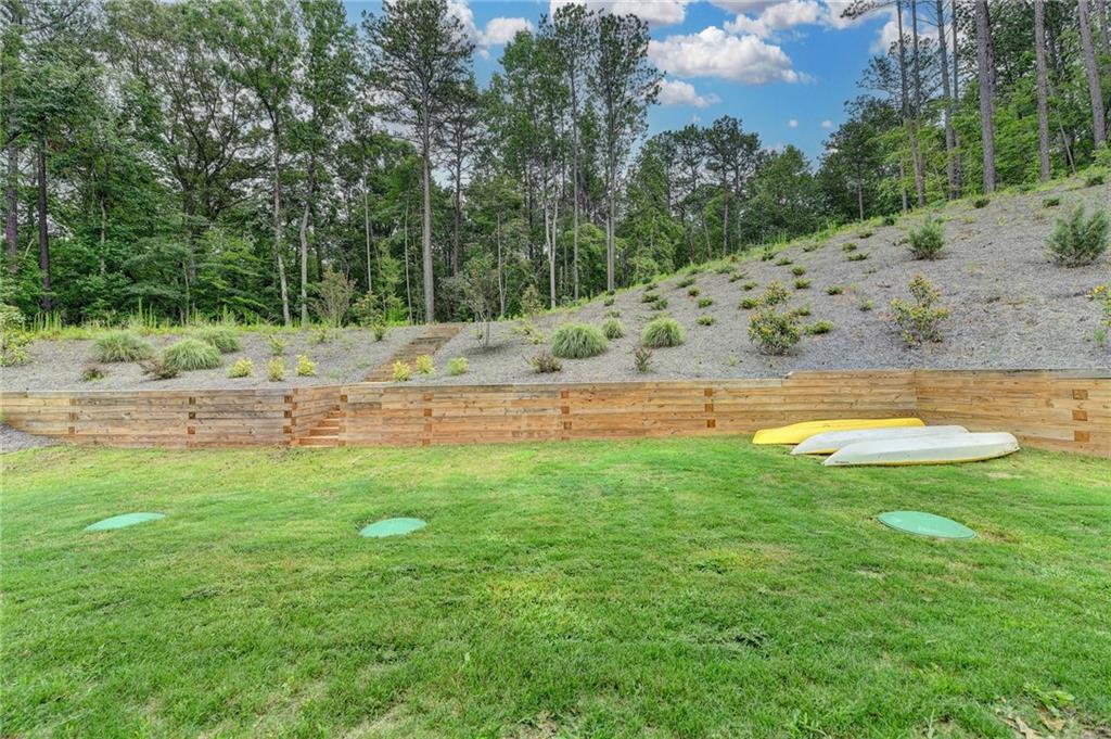 2129 Charmond Drive Monroe, GA 30656 - Photo 32 of 37 a view of a swimming pool with a yard