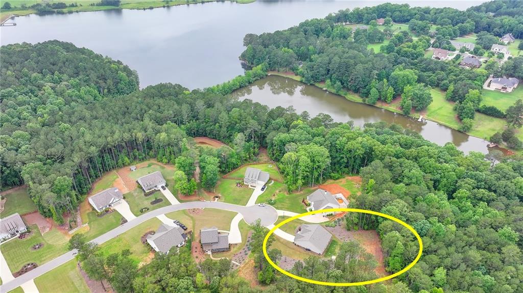 2129 Charmond Drive Monroe, GA 30656 - Photo 35 of 37 an aerial view of a house with backyard space and lake view