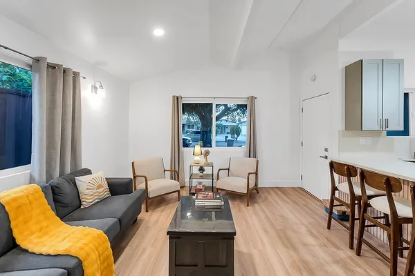 a bedroom with a bed and a desk