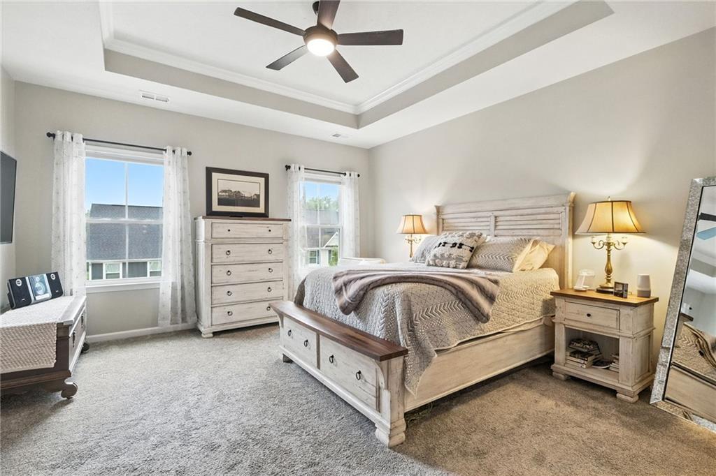 1006 Mohawk Lane Mars, PA 16046 - Photo 24 of 50 a spacious bedroom with a bed and a couch