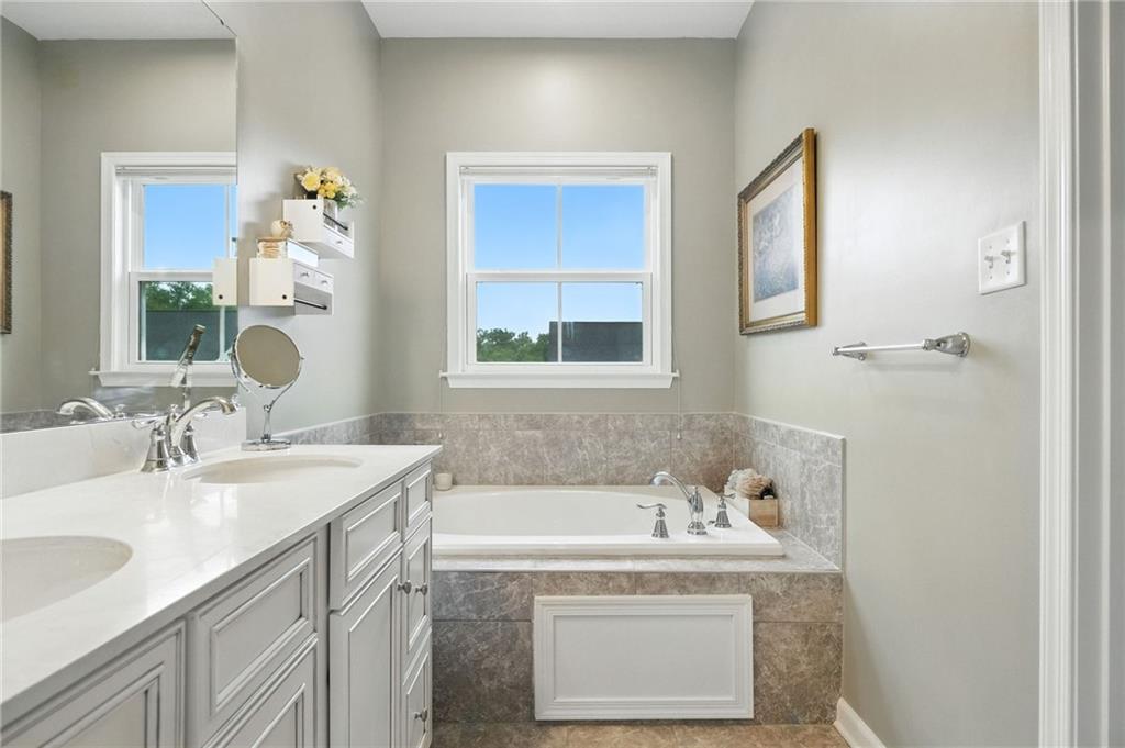 1006 Mohawk Lane Mars, PA 16046 - Photo 27 of 50 a bathroom with a sink and a mirror