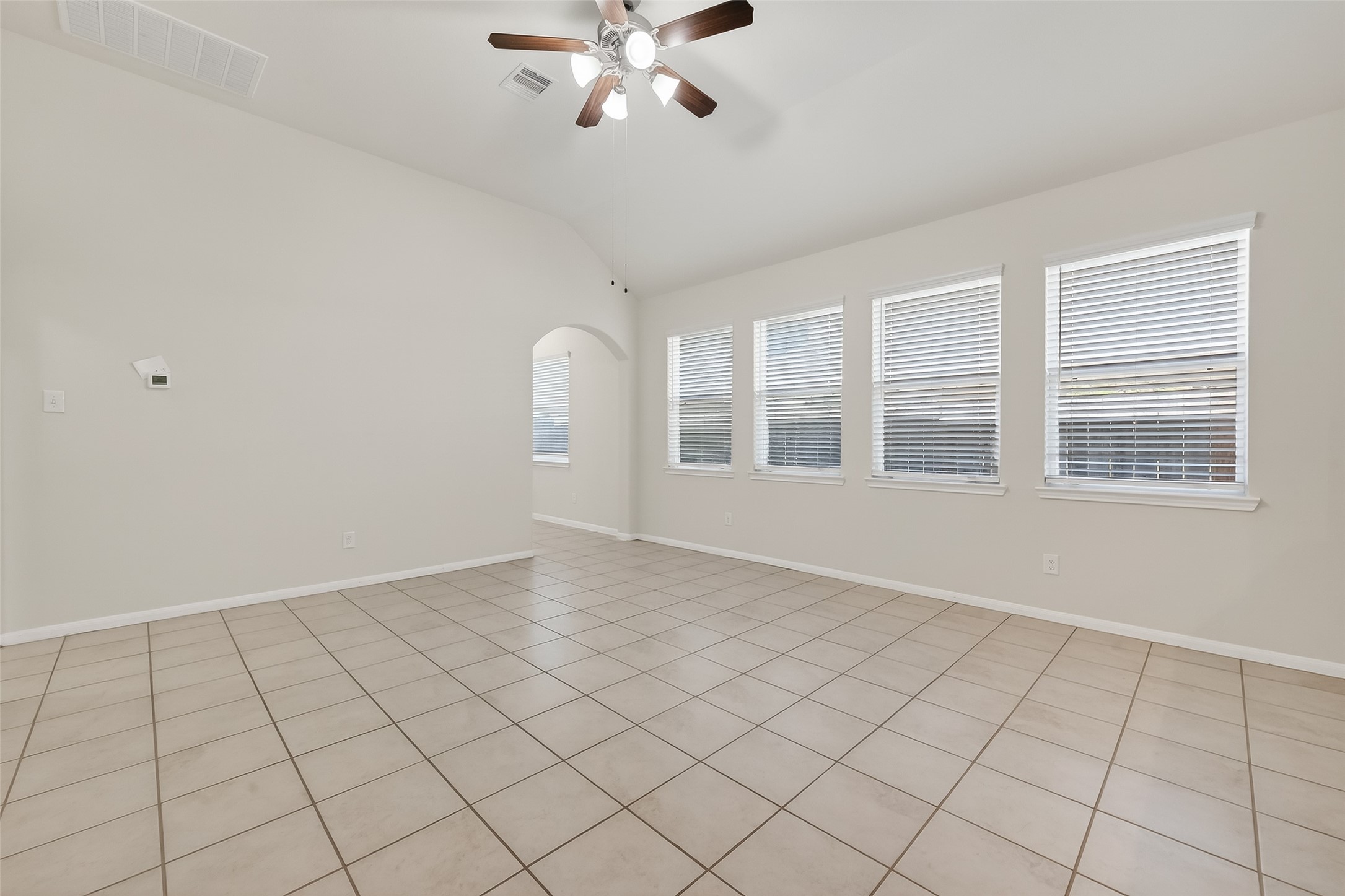 7631 Granite Terrace Lane Houston, TX 77083 - Photo 8 of 46 a view of an empty room with a window