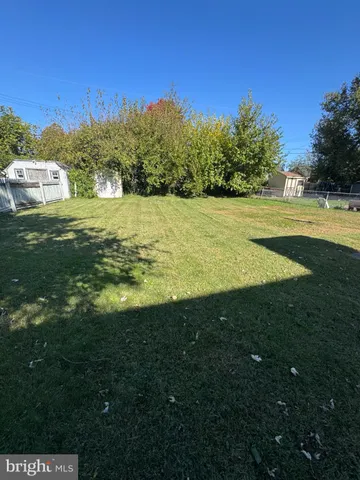 a view of a lake with a yard