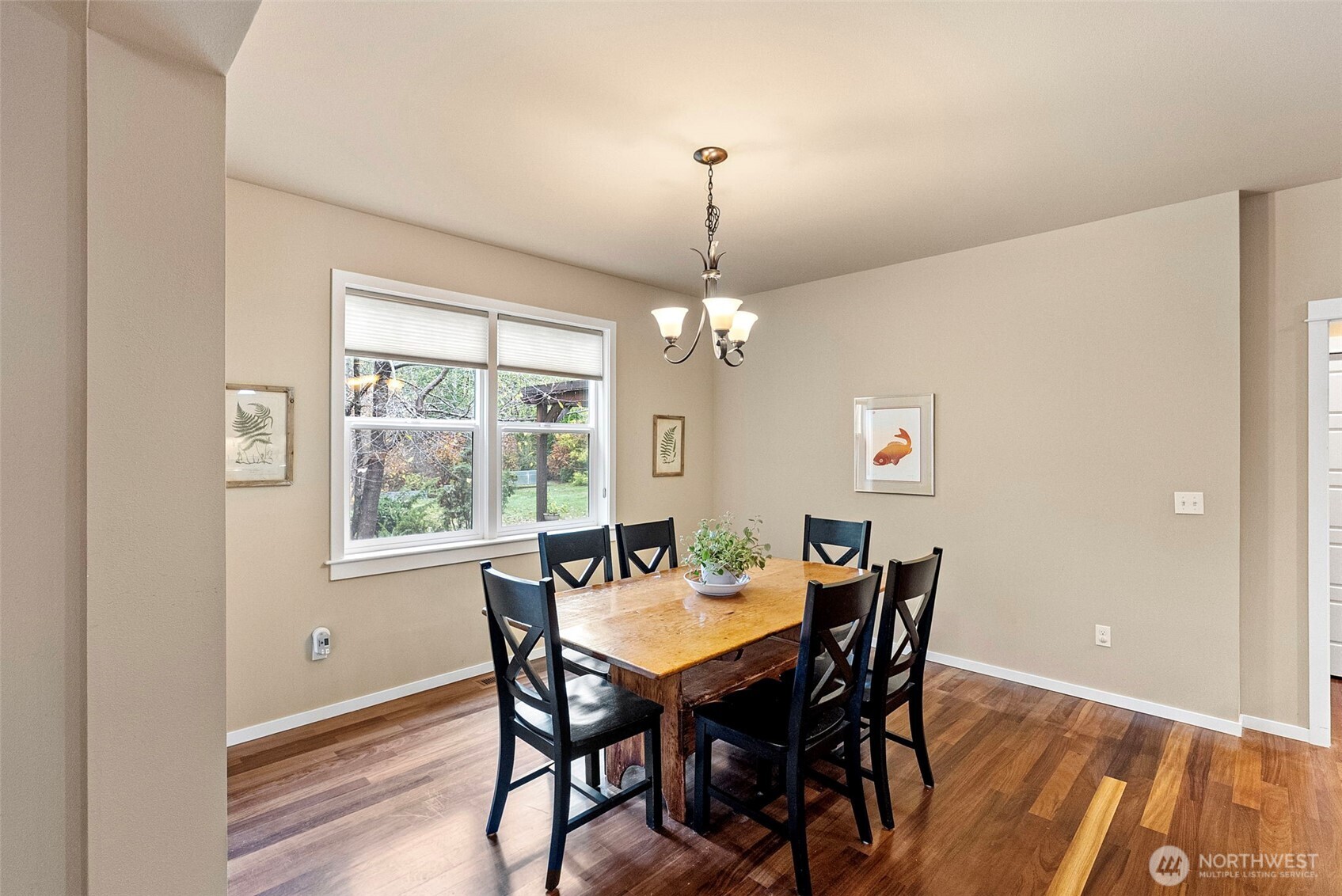 10574 Sidney Road Southwest Port Orchard, WA 98367 - Photo 11 of 37 a view of a dining room with furniture window and wooden floor