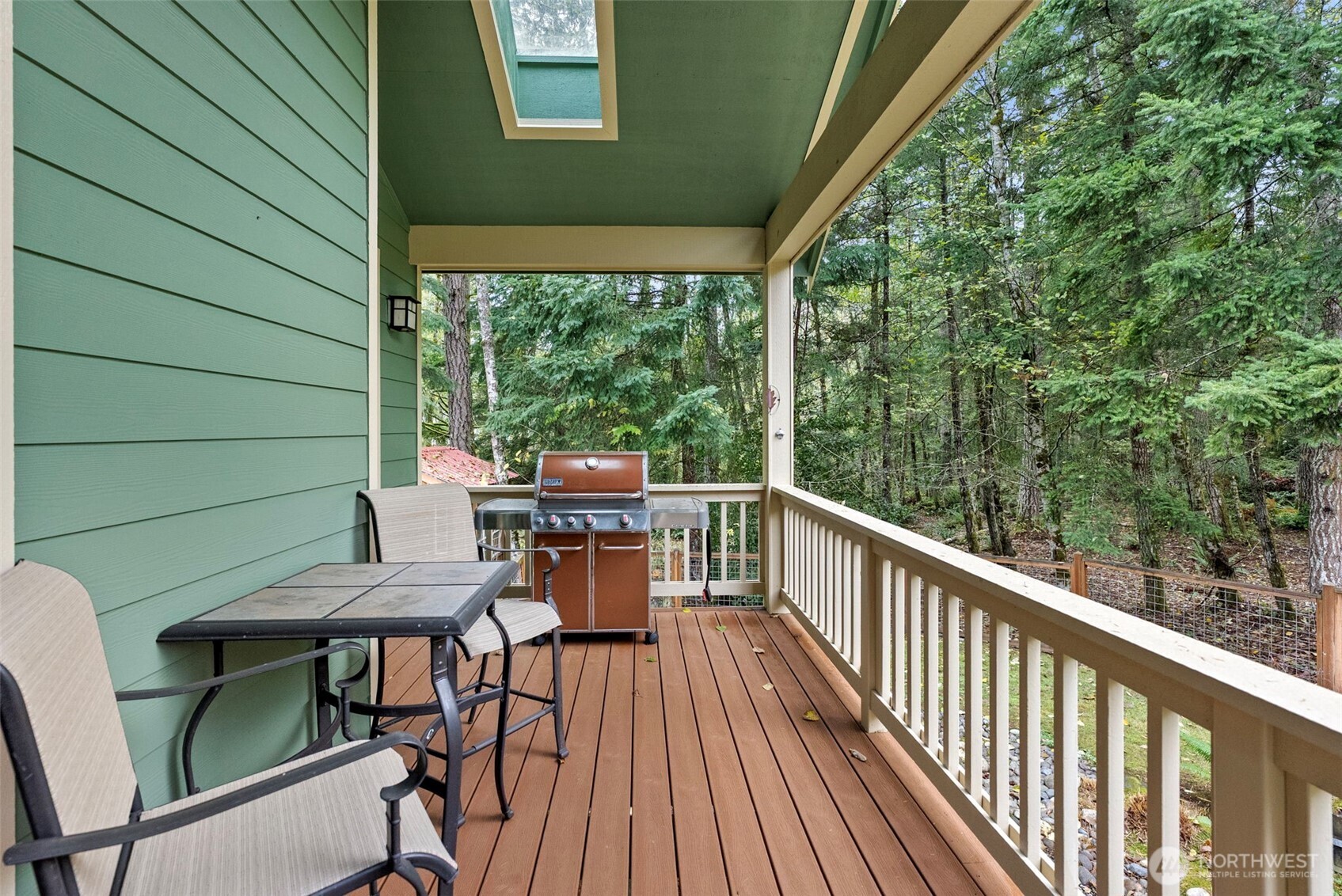 10574 Sidney Road Southwest Port Orchard, WA 98367 - Photo 14 of 37 a view of a balcony with chairs