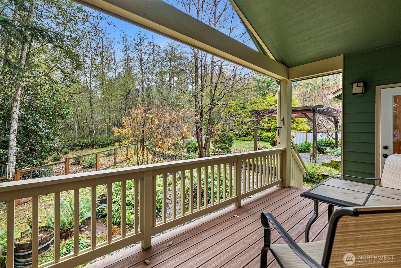 10574 Sidney Road Southwest Port Orchard, WA 98367 - Photo 15 of 37 a view of a balcony with wooden floor