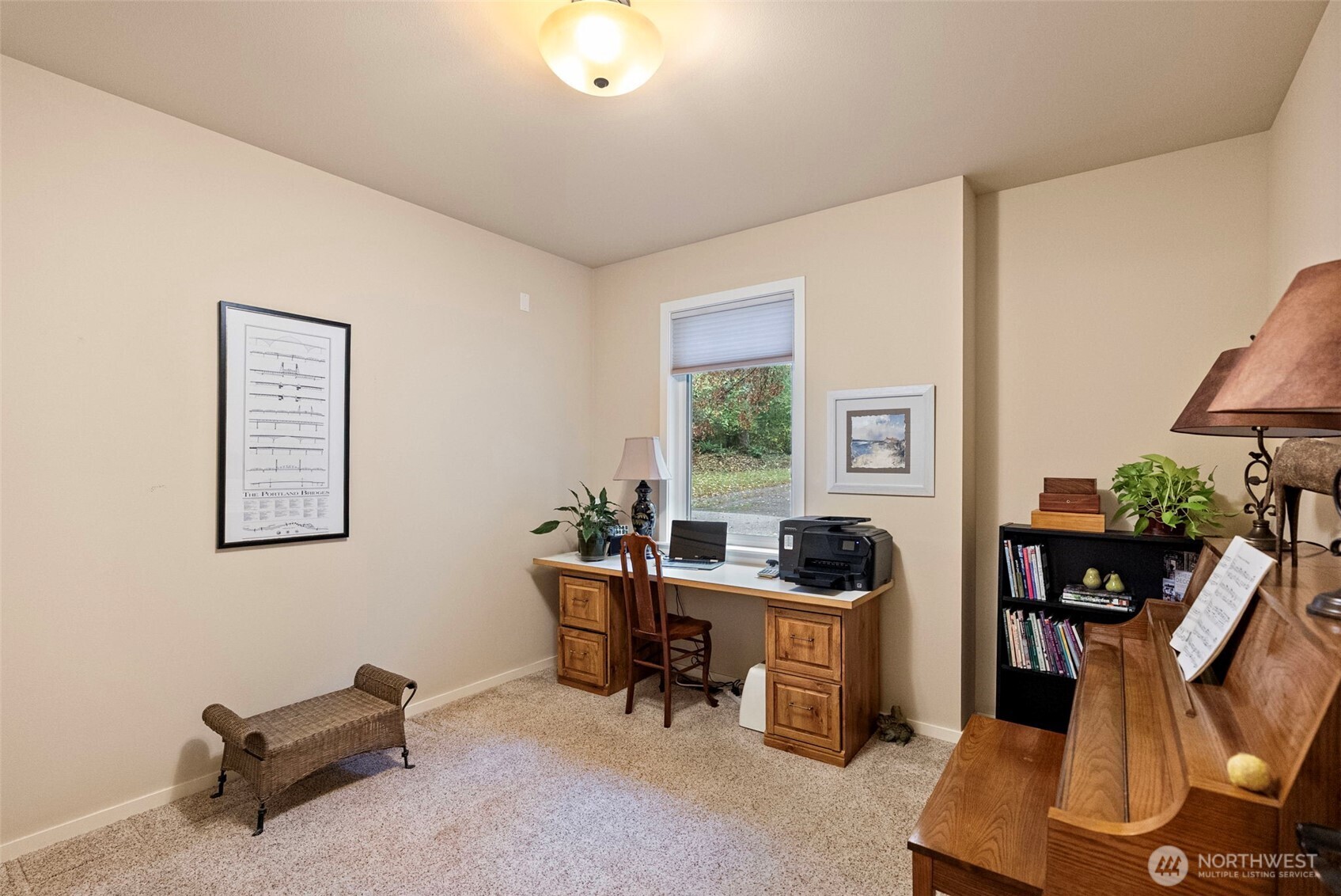 10574 Sidney Road Southwest Port Orchard, WA 98367 - Photo 17 of 37 a work room with furniture and windows