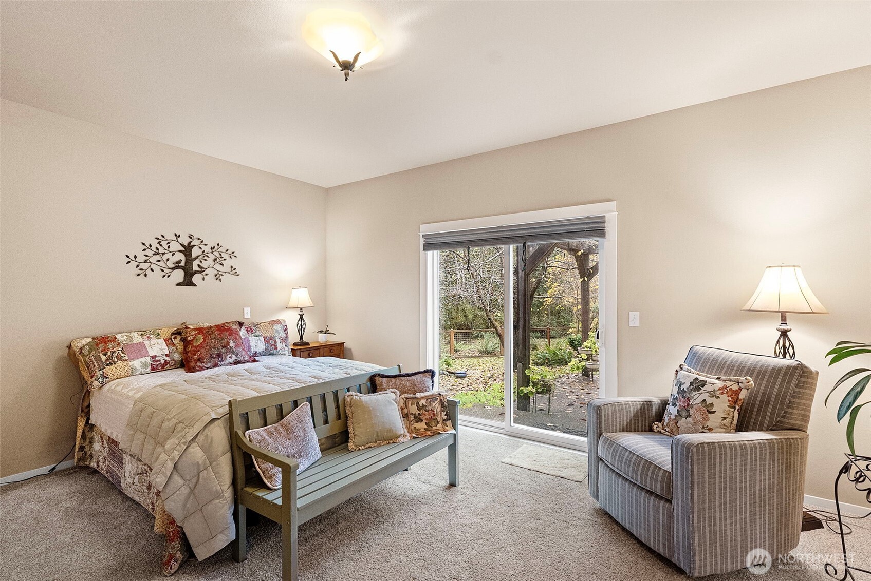 10574 Sidney Road Southwest Port Orchard, WA 98367 - Photo 22 of 37 a bedroom with a bed and a couch