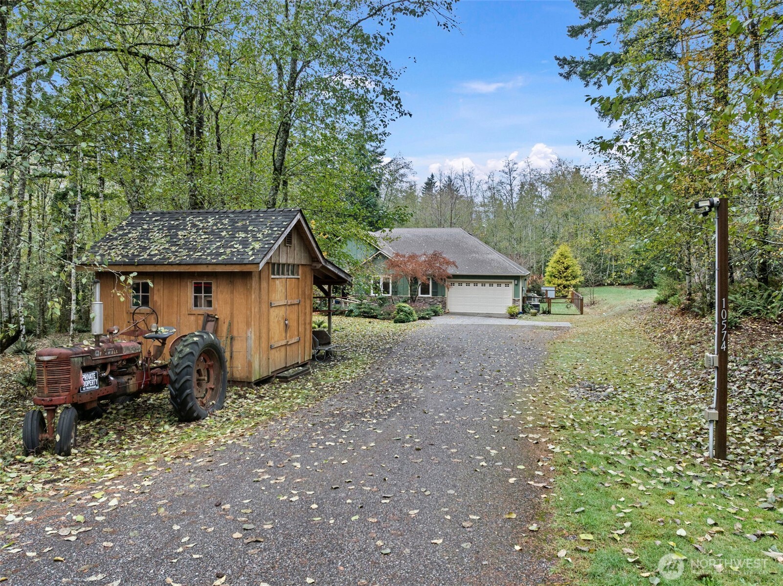 10574 Sidney Road Southwest Port Orchard, WA 98367 - Photo 32 of 37 a view of a house with backyard