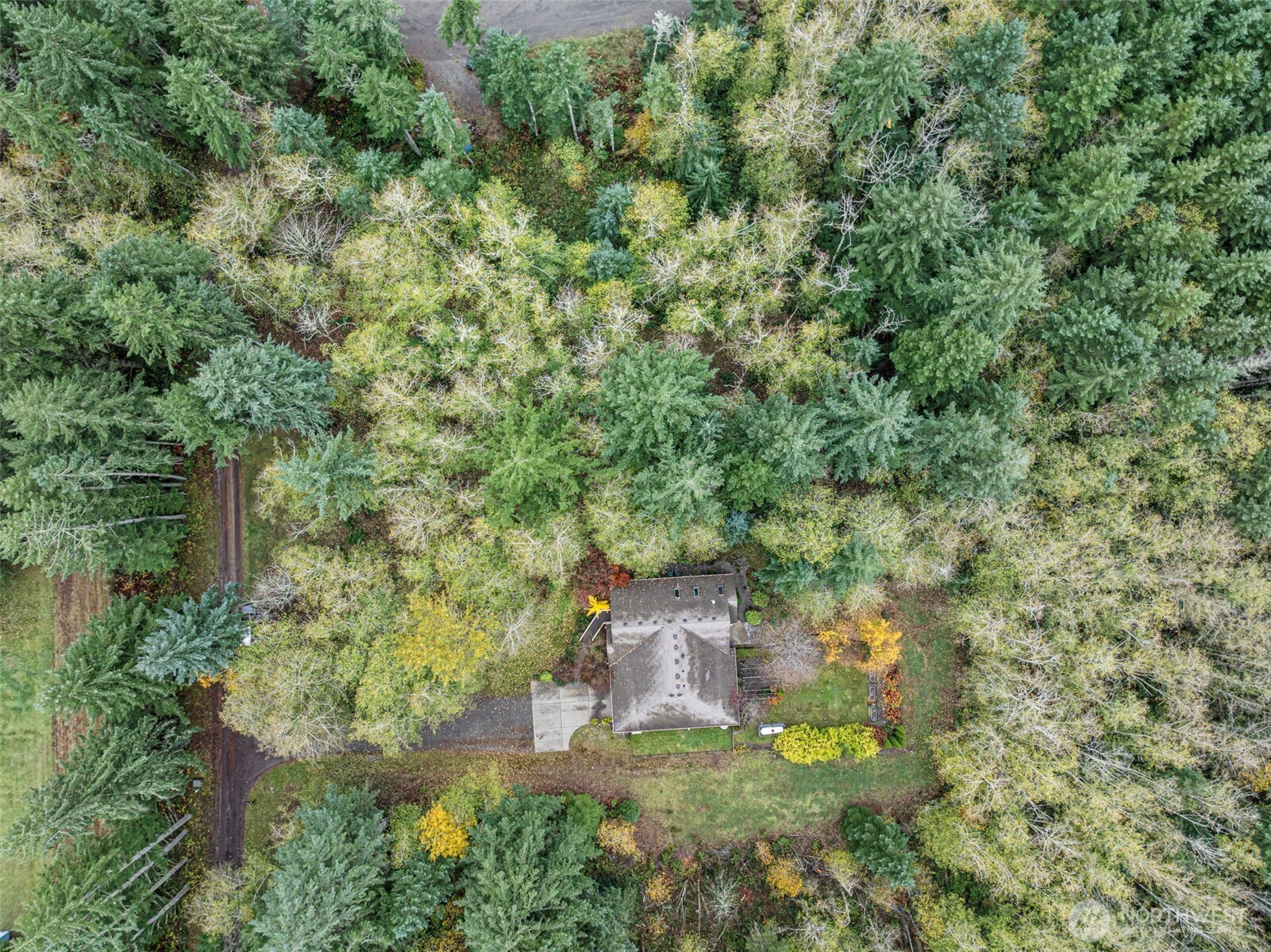 10574 Sidney Road Southwest Port Orchard, WA 98367 - Photo 35 of 37 an aerial view of residential house with outdoor space
