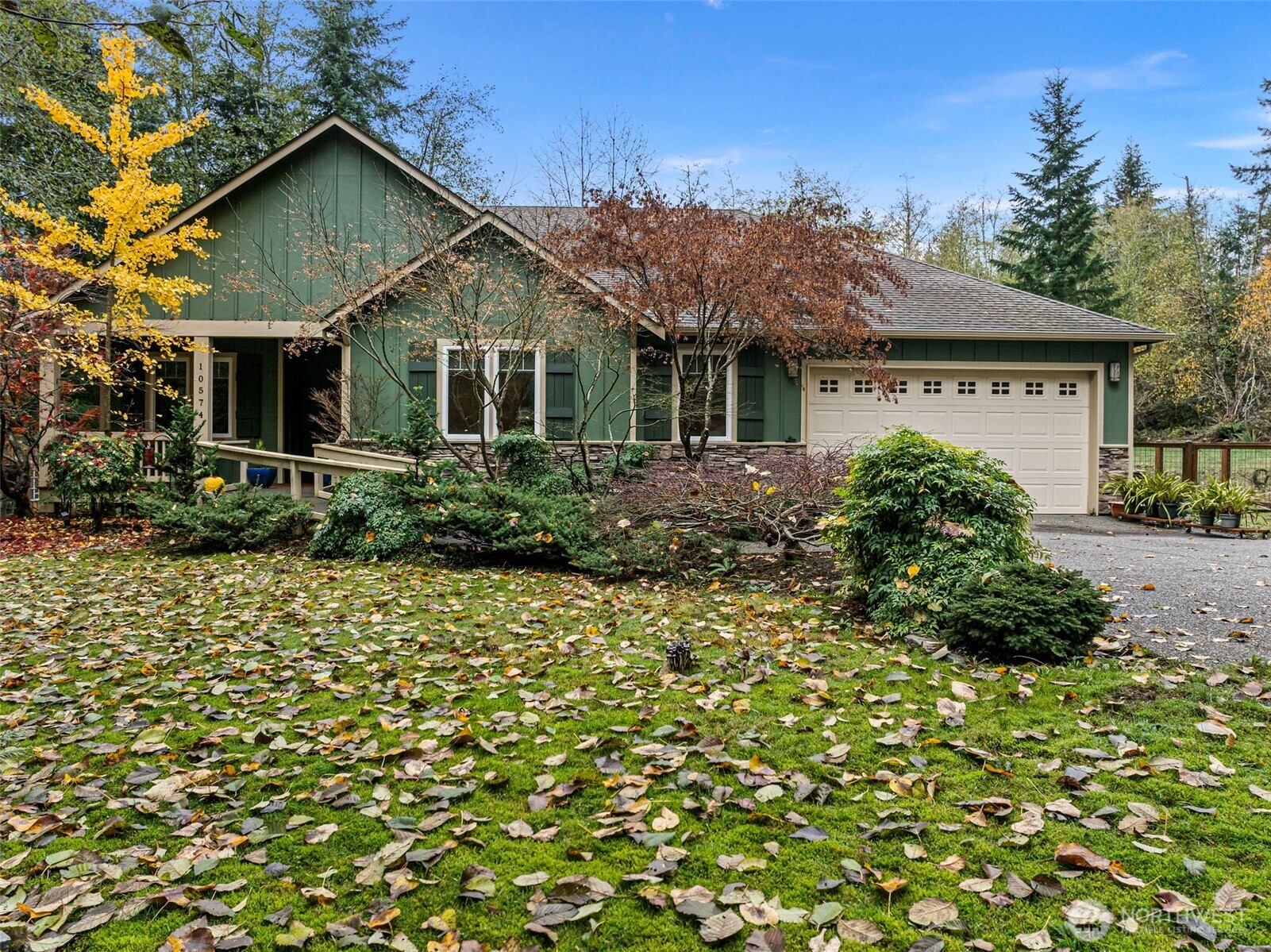 10574 Sidney Road Southwest Port Orchard, WA 98367 - Photo 36 of 37 a front view of a house with garden