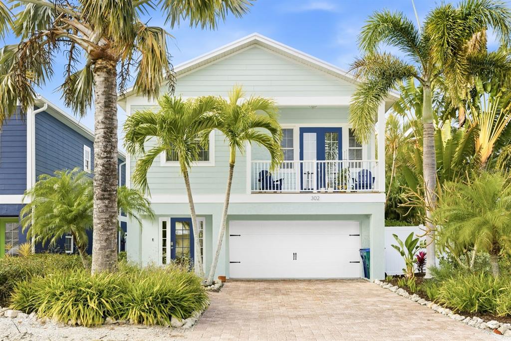 302 62nd Street Holmes Beach, FL 34217 - Photo 1 of 1 a view of a house with a patio