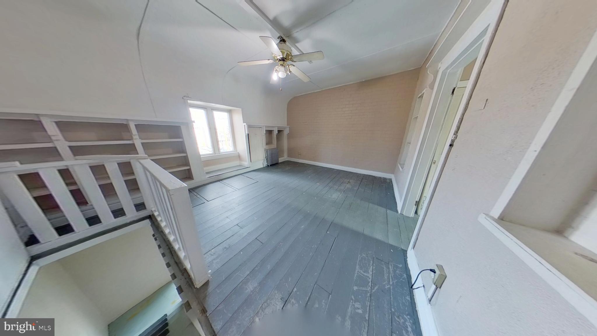 702 West Philadelphia Street, Unit 2 York, PA 17401 - Photo 2 of 10 a view of an empty room with a window