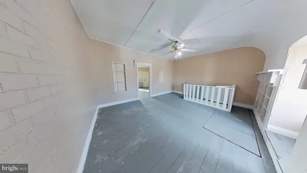 a view of a livingroom with a staircase