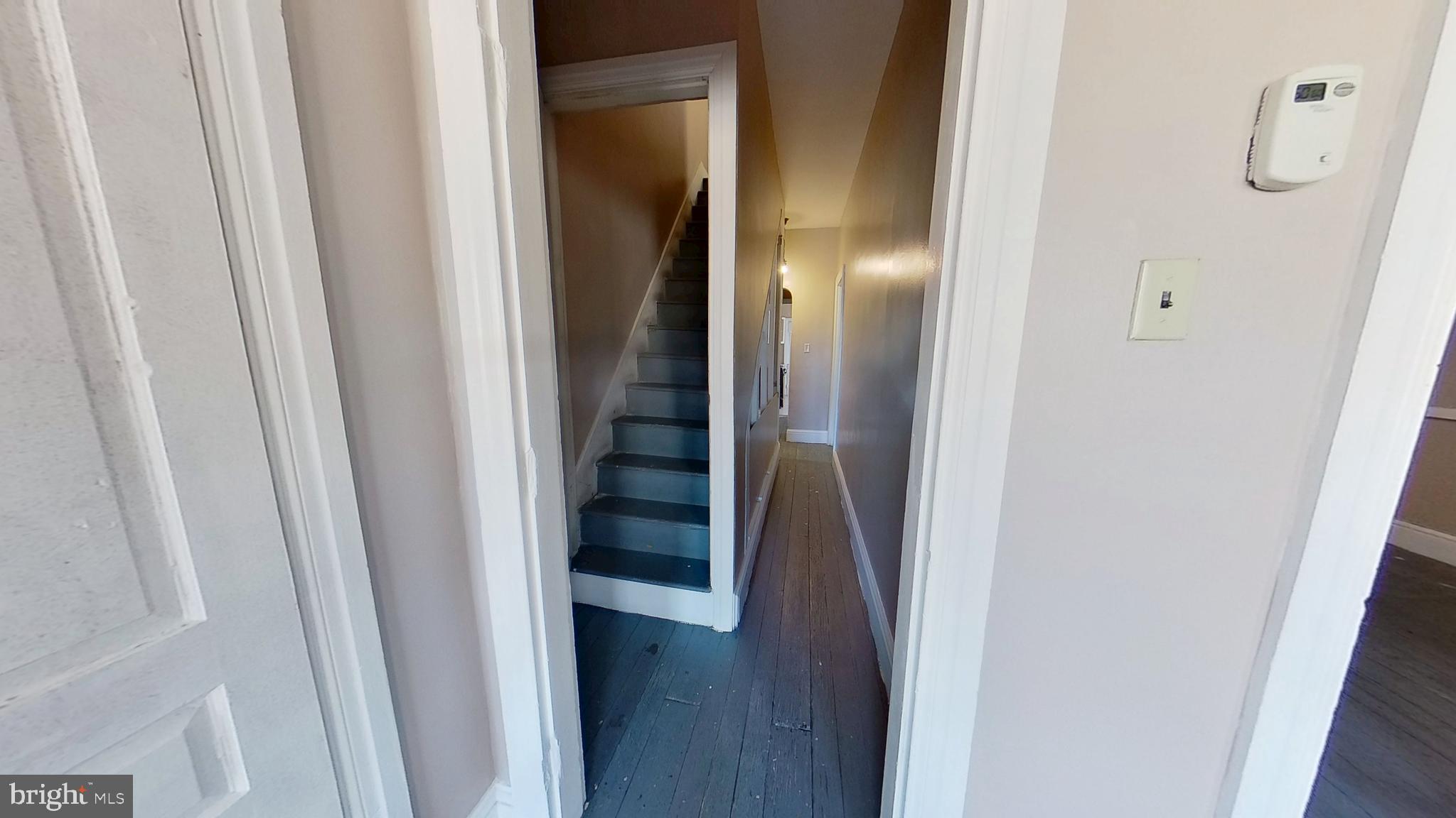 702 West Philadelphia Street, Unit 2 York, PA 17401 - Photo 5 of 10 a view of a hallway with wooden floor
