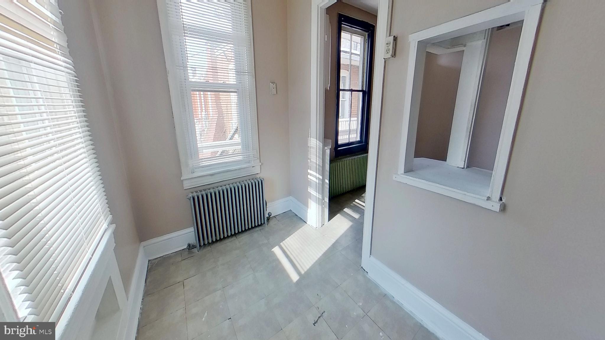 702 West Philadelphia Street, Unit 2 York, PA 17401 - Photo 9 of 10 a view of an empty room with a window