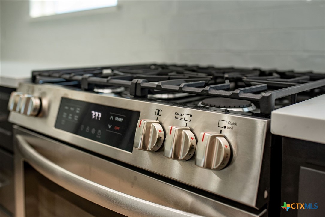 74 Whooping Crane Street Port O'Connor, TX 77982 - Photo 31 of 43 a close view of a stove top oven