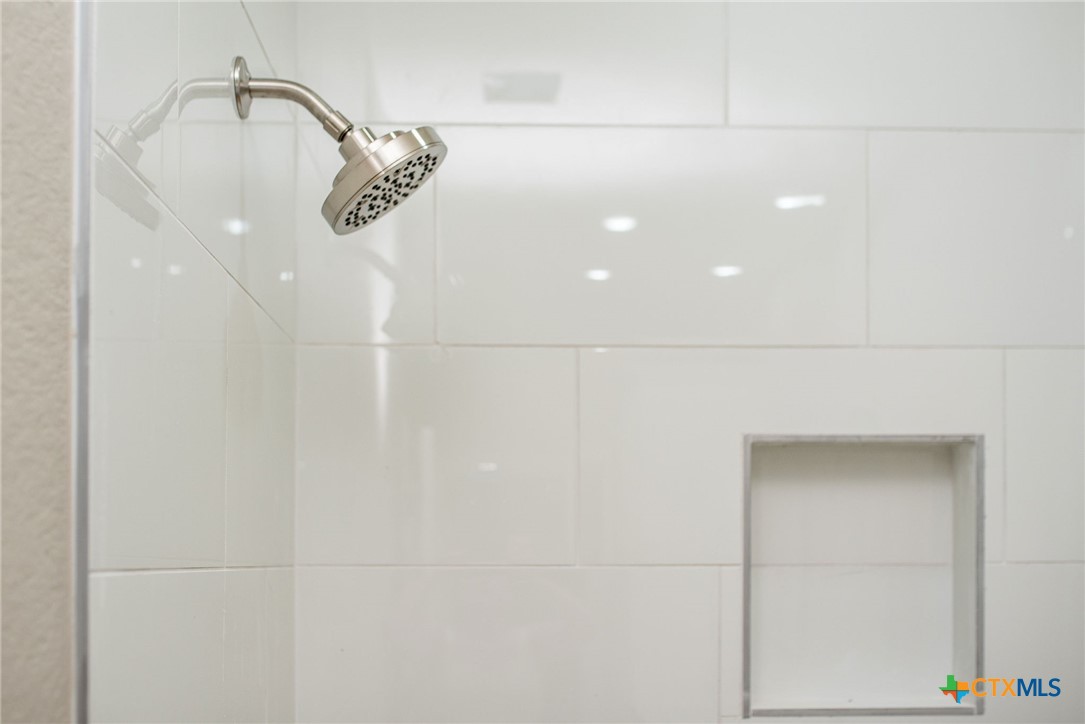 74 Whooping Crane Street Port O'Connor, TX 77982 - Photo 36 of 43 a close view of a shower in a bathroom