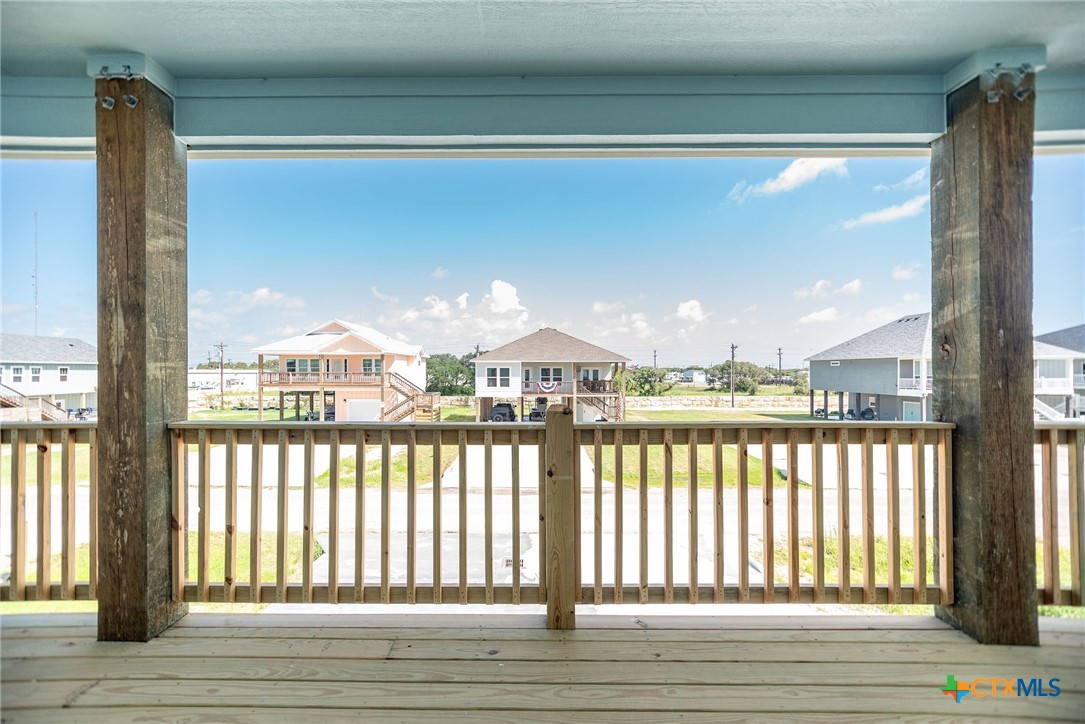 74 Whooping Crane Street Port O'Connor, TX 77982 - Photo 4 of 43 a view of a large window with an outdoor space