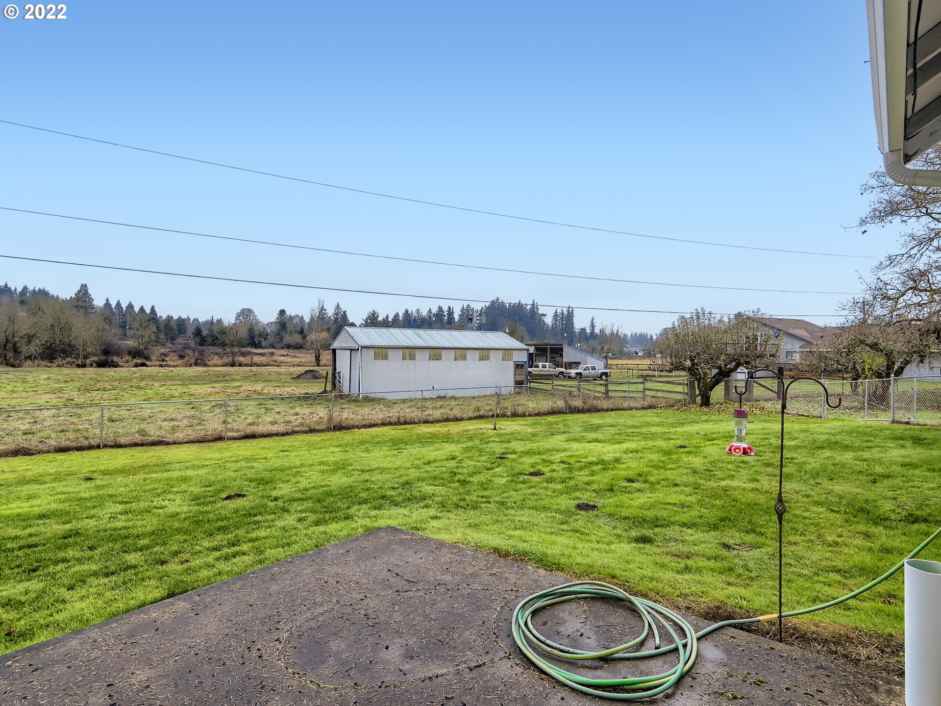 1505 Northeast 194th Street Ridgefield, WA 98642 - Photo 25 of 28 a backyard of a house with appliances and wooden floor