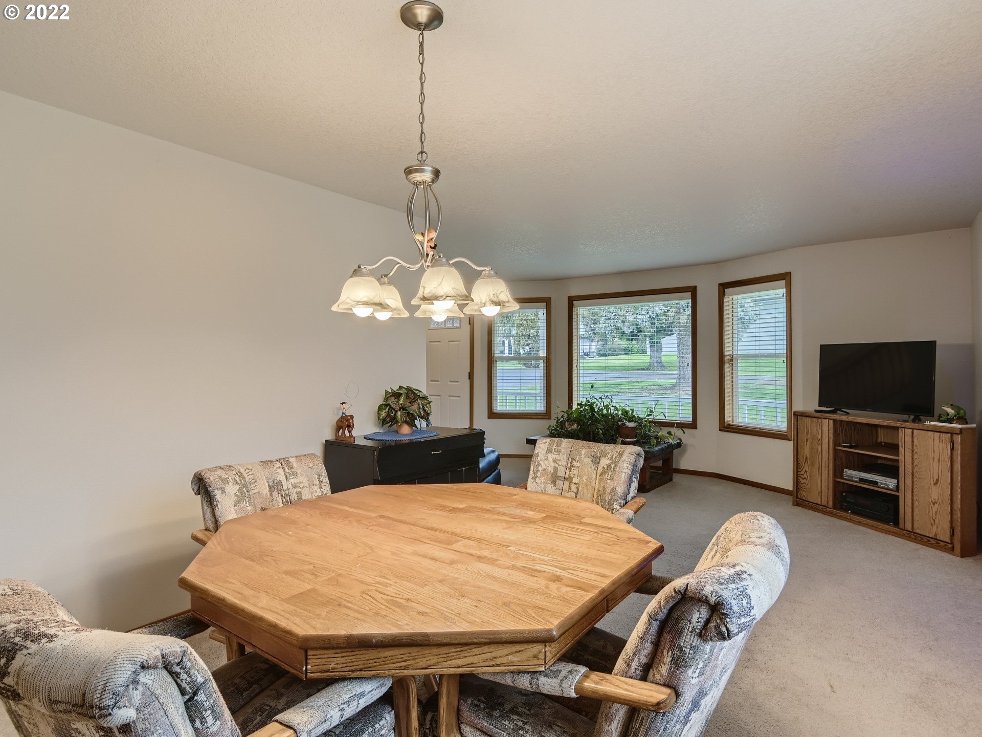 1505 Northeast 194th Street Ridgefield, WA 98642 - Photo 8 of 28 a view of a dining room with furniture window and outside view
