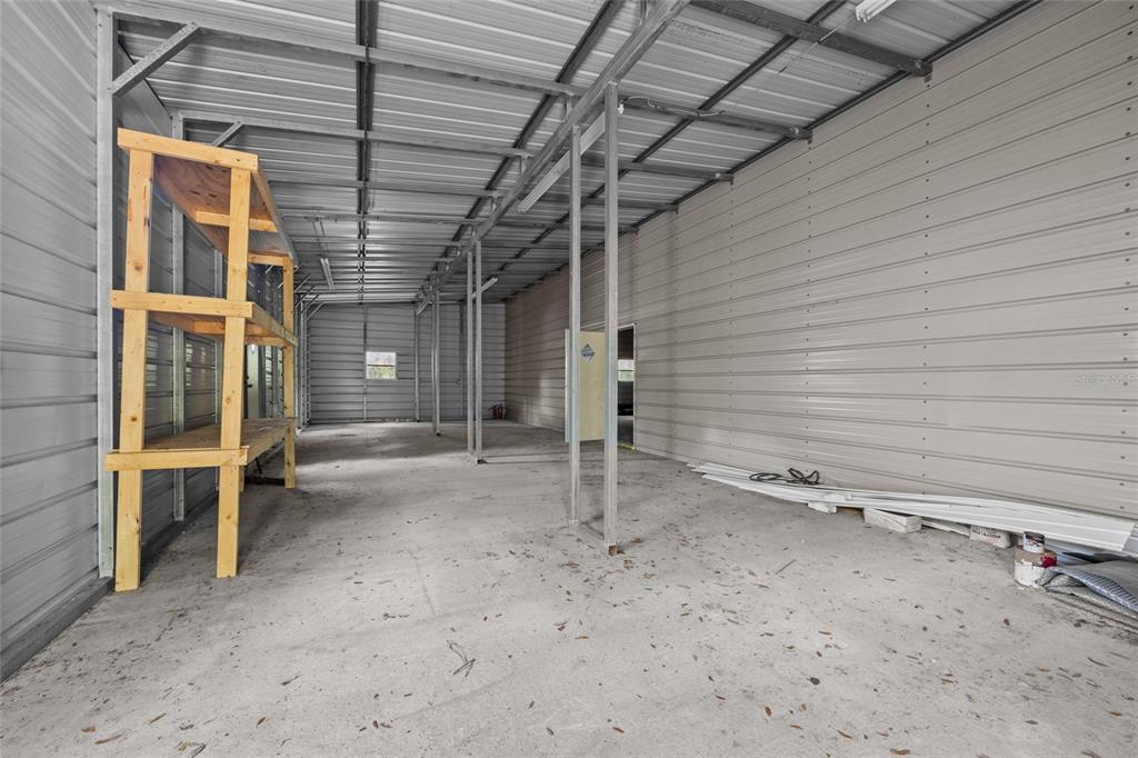 240 Swan Lake Road Melrose, FL 32666 - Photo 24 of 44 a view of a room with wooden walls