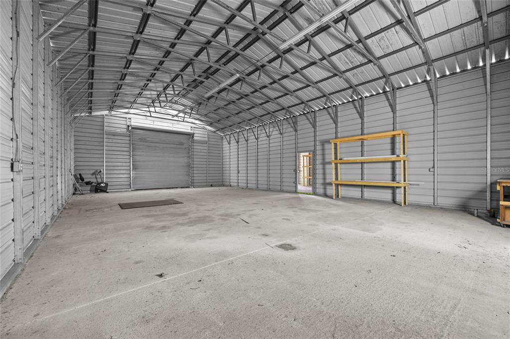 240 Swan Lake Road Melrose, FL 32666 - Photo 25 of 44 a view of a garage