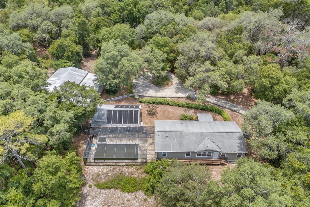 240 Swan Lake Road Melrose, FL 32666 - Photo 33 of 44 an aerial view of a house with a yard