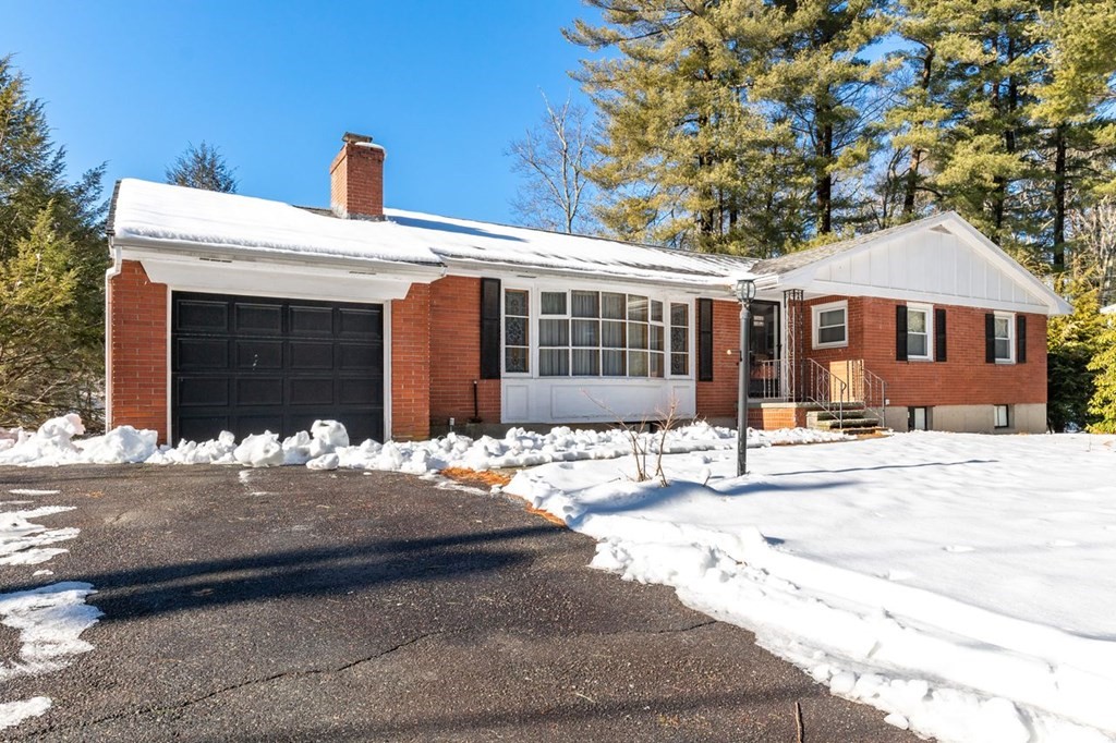 524 South Border Road Winchester, MA 01890 - Photo 1 of 24 a front view of a house with a yard