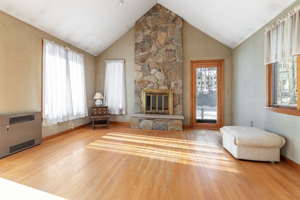 524 South Border Road Winchester, MA 01890 - Photo 13 of 24 a spacious bedroom with a bed and a window