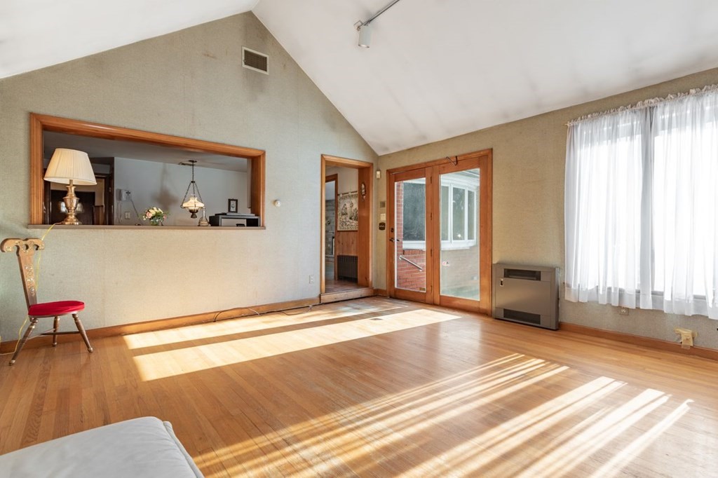 524 South Border Road Winchester, MA 01890 - Photo 15 of 24 a view of a livingroom with wooden floor and a couch