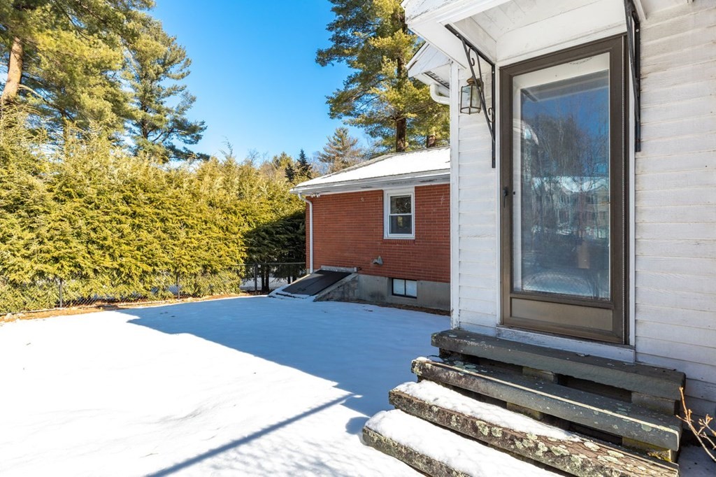 524 South Border Road Winchester, MA 01890 - Photo 23 of 24 a backyard of a house with seating space