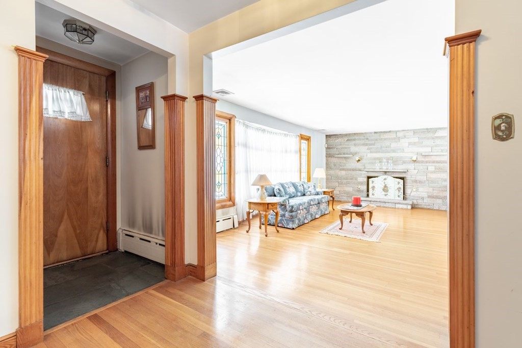 524 South Border Road Winchester, MA 01890 - Photo 3 of 24 a view of a livingroom with furniture and a window