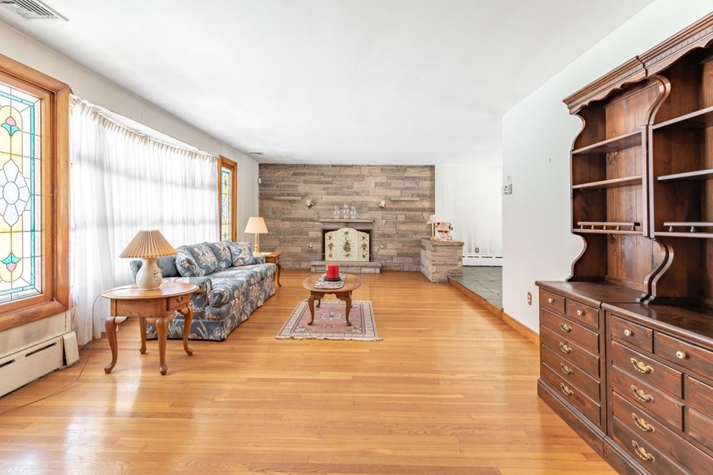524 South Border Road Winchester, MA 01890 - Photo 4 of 24 a living room with furniture and a large window