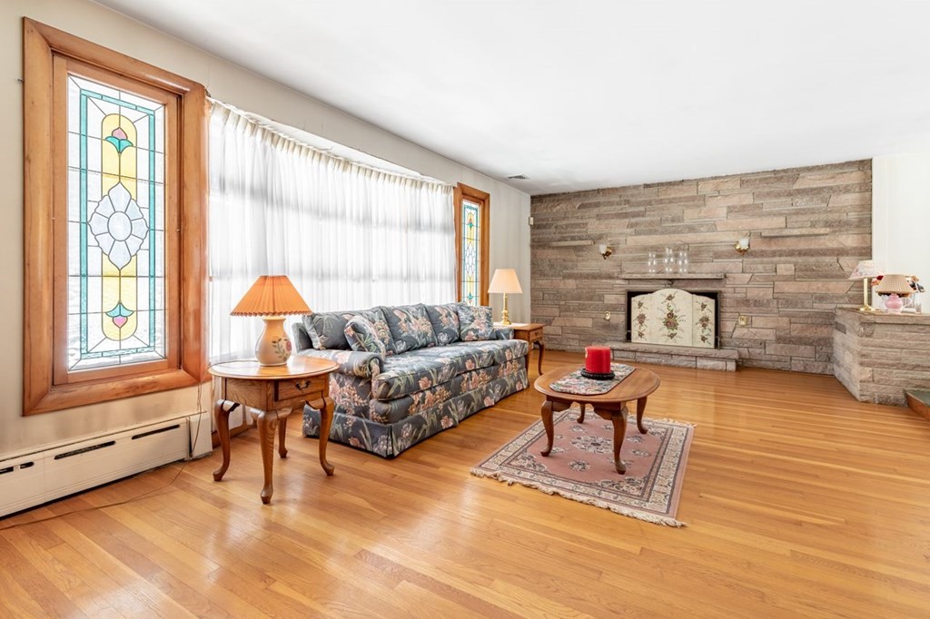 524 South Border Road Winchester, MA 01890 - Photo 5 of 24 a living room with furniture and a large window
