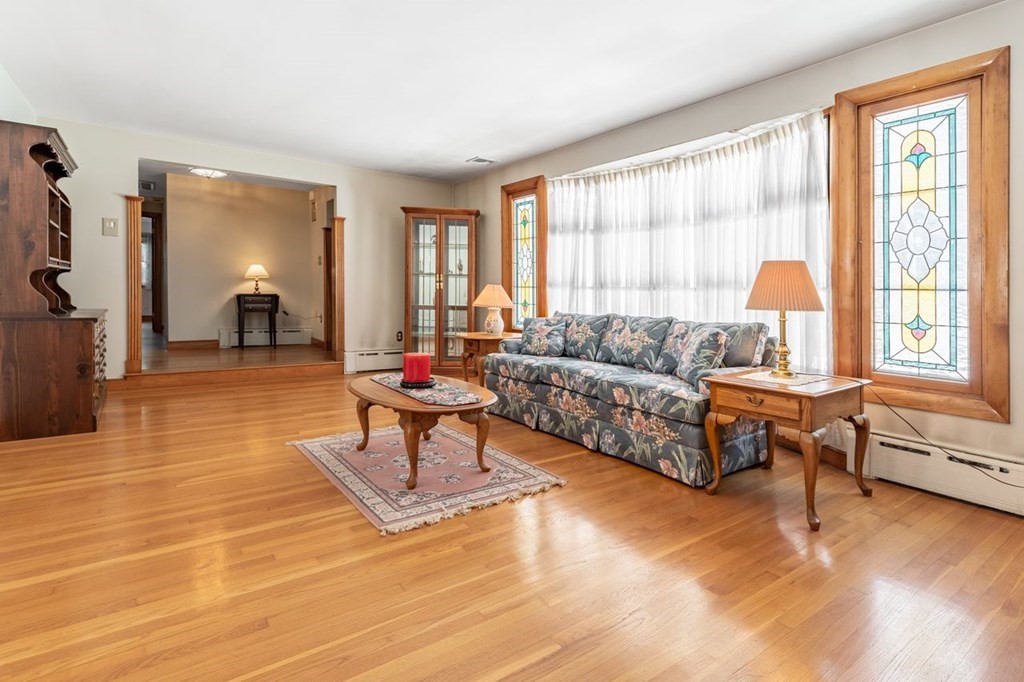 524 South Border Road Winchester, MA 01890 - Photo 6 of 24 a living room with furniture and a window