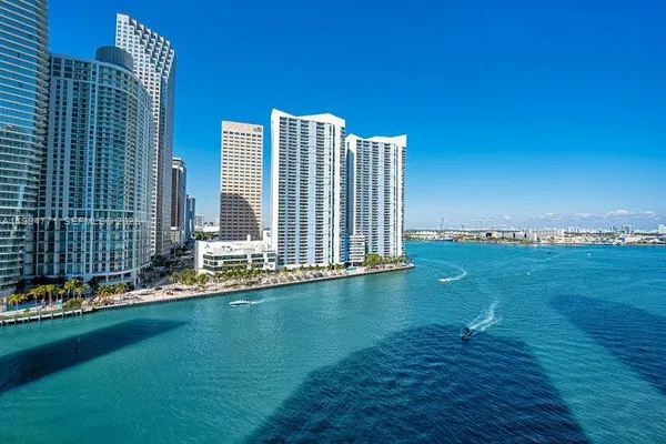a view of a city with tall buildings