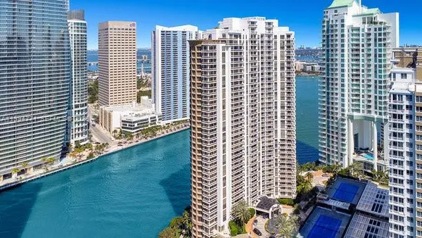 a view of a city with tall buildings